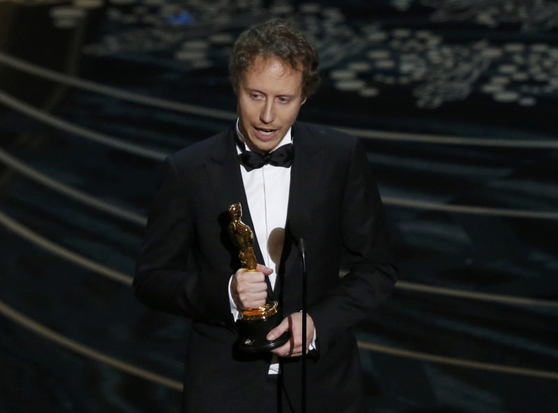 Director Laszlo Nemes of Hungary holds his Oscar for the Best Foreign Film for his movie "Son of Saul" at the 88th Academy Awards in Hollywood