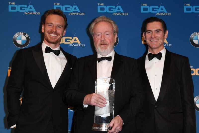 Actors Michael Fassbender  and Billy Crudup  flank Ridley Scott (C) as he poses with the DGA Lifetime Achievement Award in the press room at the 69th Annual Directors Guild Awards (DGA) in Beverly Hills, California 